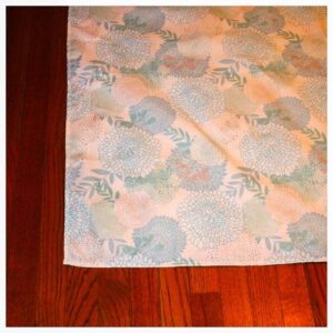 How To Turn a Tablecloth into a Rug Image